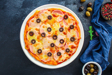 pizza sausage salami, olives and cheese. Menu concept food background. top view. copy space for text