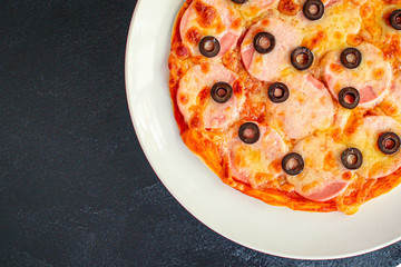 pizza sausage salami, olives and cheese. Menu concept food background. top view. copy space for text