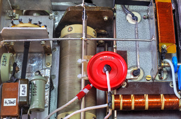 Inside view of high frequency power amplifier with capacitors, coils and other components