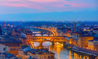 Fototapeta na wymiar Ponte Vecchio over Arno river at twilight blue hour - Florence, Italy