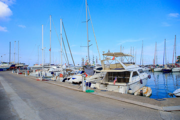 Yachts at the pier in summer at the port