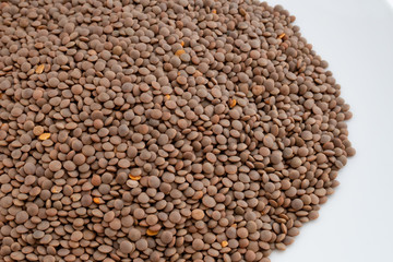 Close up view of dried brown lentils