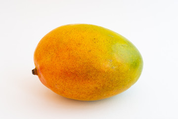 Closeup of a mango fruit isolated on a white background