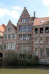 Fototapeta premium Residential buildings at the riverfront in Ghent, Belgium