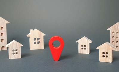 Red navigation pointer in a city town. Places and sights. Location routes. Travel, choosing a new...