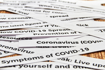 Coronavirus, covid-19, newspaper headline clippings. Concept of COVID-19. Closeup