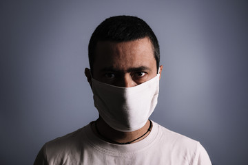 portrait of a man with protective medical mask