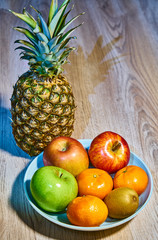 Fruits on plate and table