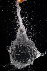 Exploding water balloons with a needle