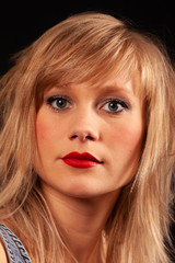Blonde girl, close-up portrait