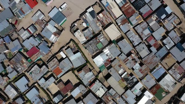 rooftops of corrugated iron huts in a ghetto