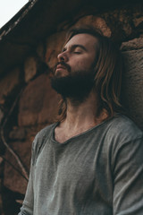 Man meditating on the wall