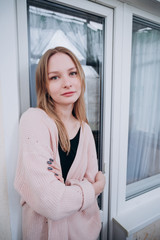 a guy and a girl sit at home in quarantine and smoke on the balcony