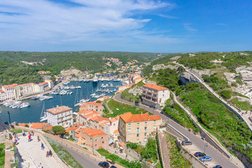 Fototapeta na wymiar View from above of Bonifacio port and church of St. John the Baptist in Bastia, in Corsica, France.