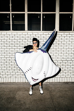 Fashion girl portrait staying in swimming glasses and smile