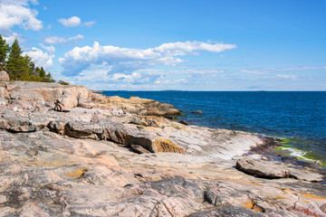 Fototapeta na wymiar View of the rocky shore and Gulf of Finland, Isosaari island, Helsinki, Finland