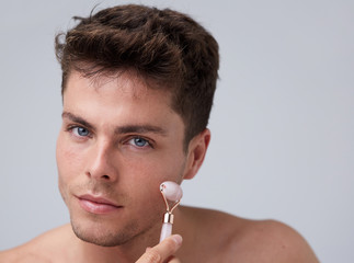 Man using stone roller