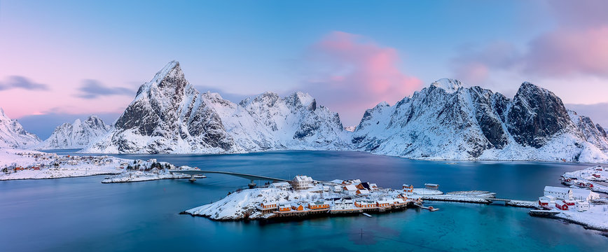 Panoramic view from above to Sakrisøya Island with mountains on background at sunrise - Lofoten Islands, Norway. Europe