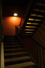 Obraz premium dark stairway with light