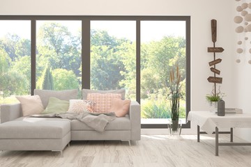 White living room with sofa and summer landscape in window. Scandinavian interior design. 3D illustration