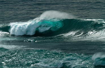 rolling blue green waves along the California coast