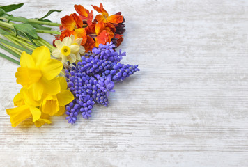 pretty spring  flowers picked from garden and arranged on bouquet on a table