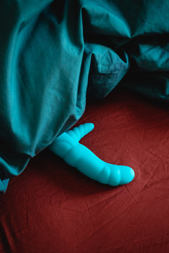 Sex toy in a bed