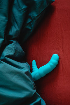 Sex toy in a bed