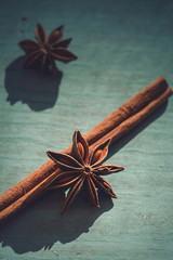star anise and cinnamon on wooden background