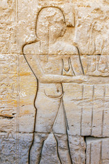 Wall with ancient hieroglyphs of Karnak Temple drawings, Luxor, Egypt