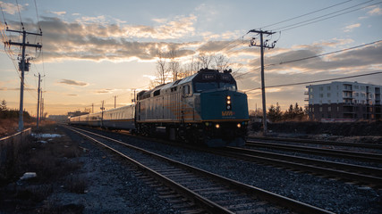 Fototapeta na wymiar Train by the sunset