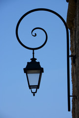 Fototapeta na wymiar Black Lamp against the blue sky