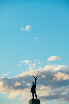 The Silhouette of Statue at the Park on Shoreline