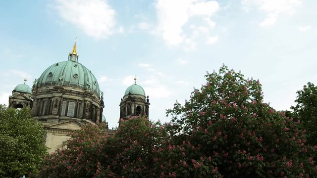 BERLIN - GERMANY, MAY 23, 2017, Cathedral building and boat on Spree river in nasty day