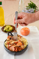 spaghetti with sauce and vegetables 