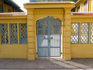 Fototapeta premium Walls with wooden doors are vintage yellow.