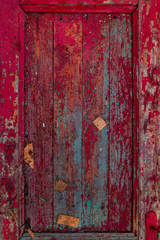 Old door covered red paint