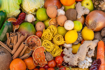 Colorful composition of assorted vegetables: tomato,lettuce, cabbage, onions, bell peppers,Studio photography. No people. Healthy eating concept. Organic and fresh food concept.on  background