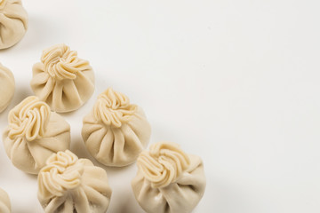 Khinkali on white background.