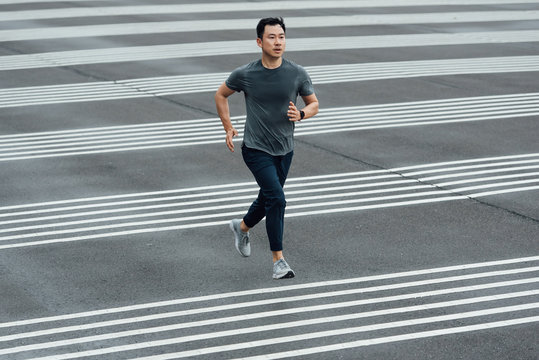 Young man jogging in the city of Taipei