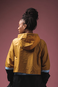 Back View Of African-American Fashionable Woman Studio Portrait