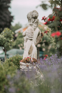 Statue of woman in the garden