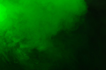 Green steam on a black background.
