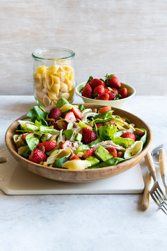 Delicious pasta salad with avocado and strawberries