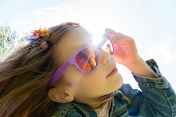 Close up of girl wearing sunglasses
