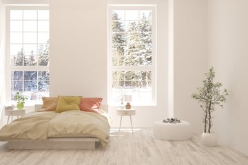 Stylish bedroom in white color with winter landscape in window. Scandinavian interior design. 3D illustration