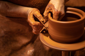 Craftsman making pottery