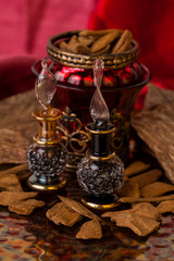 Agarwood, also called aloeswood, essential oil and incense chips