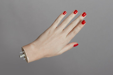 Realistic mannequin hand with red nail polish
