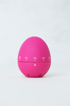 Pink egg shaped egg timer